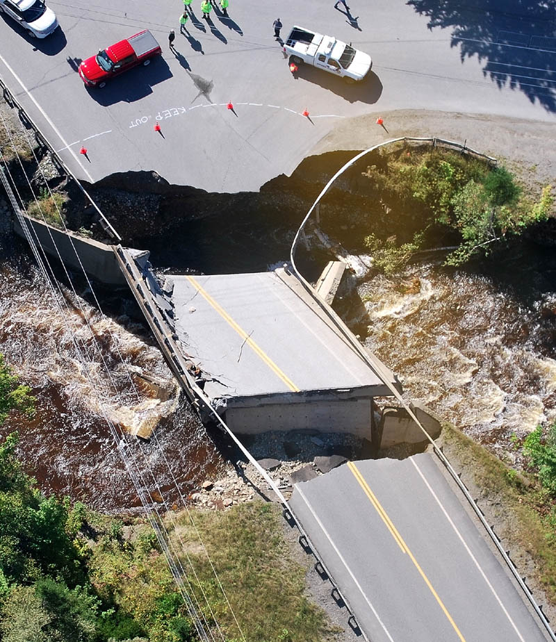Maine officials, including Gov. Paul Lepage, surveyed damage Monday from Tropical Storm Irene, including two washed out bridges on Route 27 in Carrabassett Valley. The damage cut off Sugarloaf Mountain, though Maine Department of Transportation has since established detours. According to the department, the detour for Route 27 is: from Kingfield, Route 142 to Phillips, then Route 4 from Phillips to Rangeley, then Route 16 from Rangeley to Stratton.