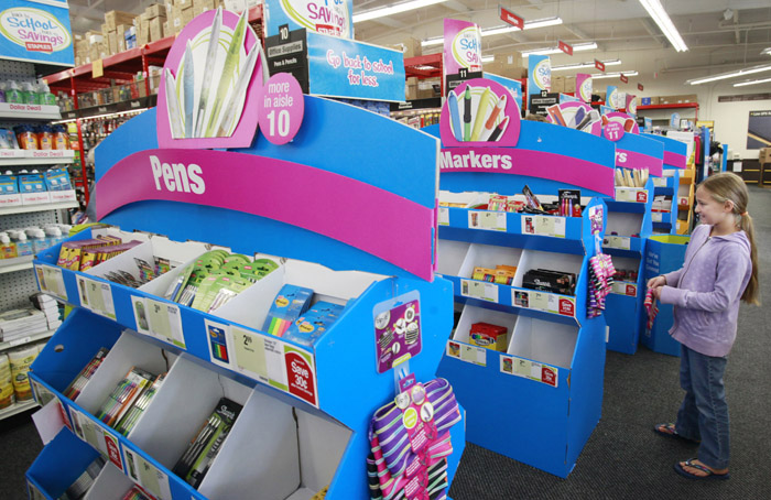 A fifth-grade student shops for school items at Staples in Menlo Park, Calif. Prices on everything from socks to notebooks are rising 10 percent on average this fall, just in time for back-to-school shopping.(AP Photo/Paul Sakuma, file)
