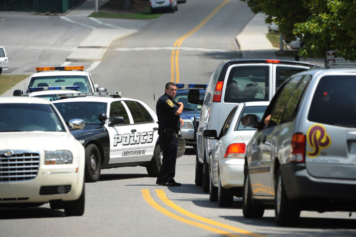Police stop traffic at Virginia Tech after a gunman was reported on campus today.