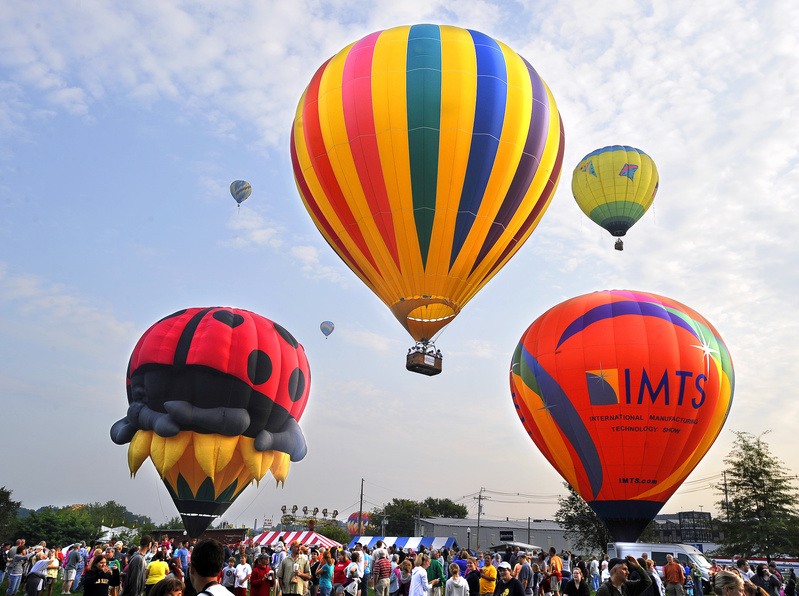 Hot air balloons are launched from Railroad Park in Lewiston at sunrise today.