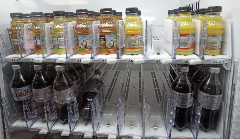 Sugarless soft drinks and fruit juices are stocked in the dispenser at Sumner Hill Junior High School in Clinton, Miss., as the school system tries to combat youth and teen obesity. Portland has begun a public information campaign called "Pouring on the Pounds" to emphasize the dangers of consuming sugary soft drinks.