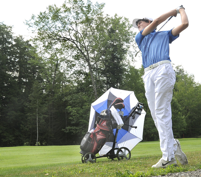 Austen Truslow hits from the short rough on the ninth hole Tuesday in the Maine Junior Amateur at Val Halla Golf Course. Truslow, who's from Florida and summers in Islesboro, shot a 1-under 71 for the first-round lead.