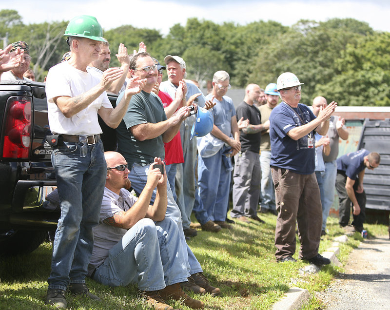 BIW workers applaud Sen. Susan Collins during her remarks Wednesday outside the Bath shipyard. BIW, which is owned by General Dynamics, has a work force of about 5,300.