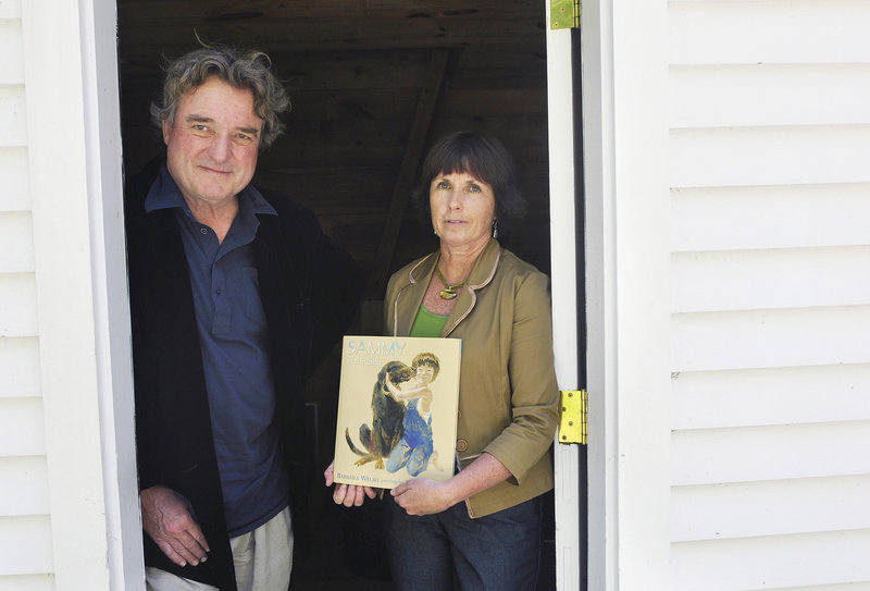 Artist Jamie Wyeth and writer Barbara Walsh at Wyeth’s home in Tenants Harbor with the new children’s book they collaborated on, “Sammy in the Sky,” based on how Walsh’s daughters dealt with the death of their dog.