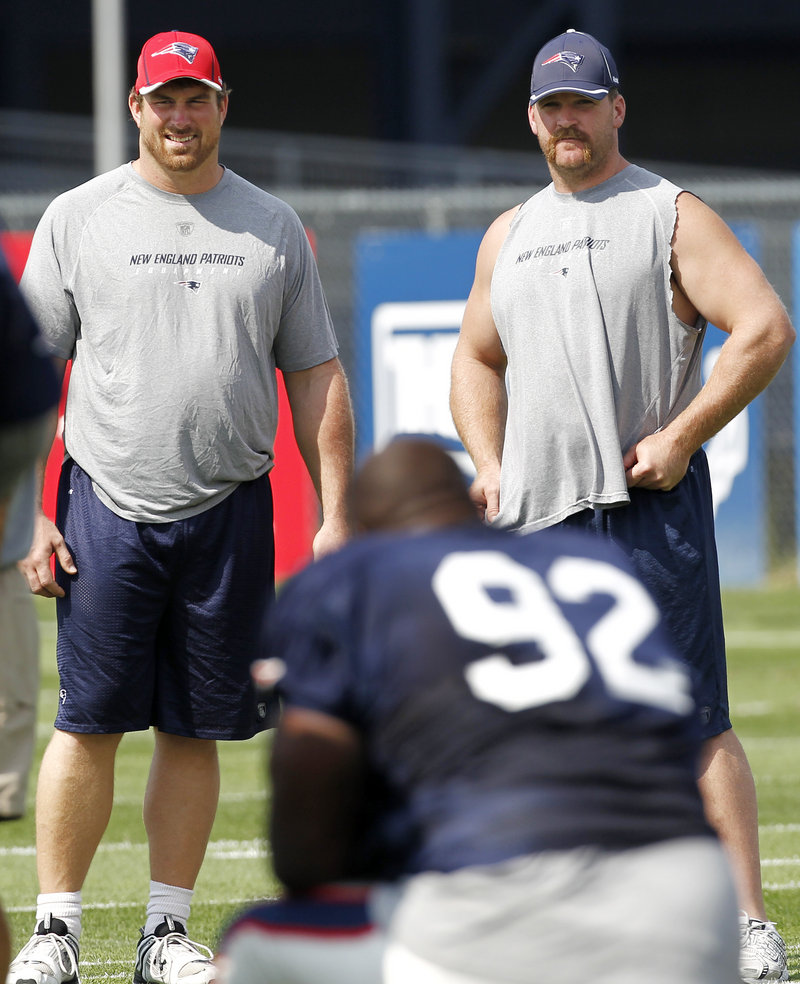 Matt Light, left, is bringing his lighthearted personality and dancing abilities back to New England after re-signing with the team.