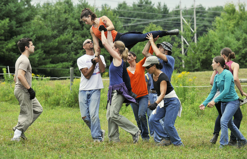 A herd of dancers rehearses last week for a performance of "UN/Stable Landscape" at Chance Encounter Farm in Pownal. The interactive dance piece, part of this year's Bates Dance Festival, will involve about two dozen humans and five horses.