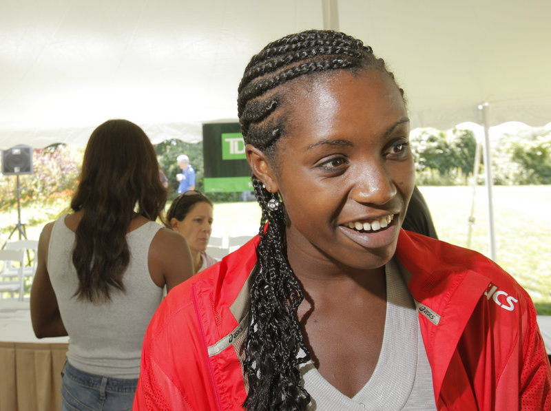 Diane Nukuri Johnson attended the University of Iowa after representing Burundi in the 2000 Sydney Olympics.