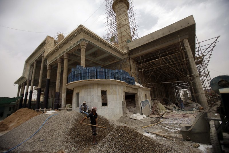 Construction workers have nearly finished rebuilding the al-Askari shrine in Samarra, 60 miles north of Baghdad, Iraq. The day the shrine was bombed – Feb. 22, 2006 – began one of the darker chapters in Iraq, sparking intense violence between Shiite and Sunni Muslims.