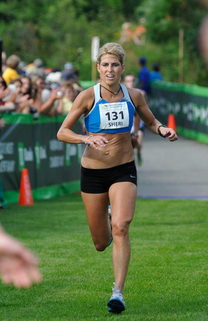 Sheri Piers didn't feel like celebrating her first-place finish among Maine women in the Beach to Beacon 10K. "You try to be happy. But it's hard because you want to celebrate with everybody."
