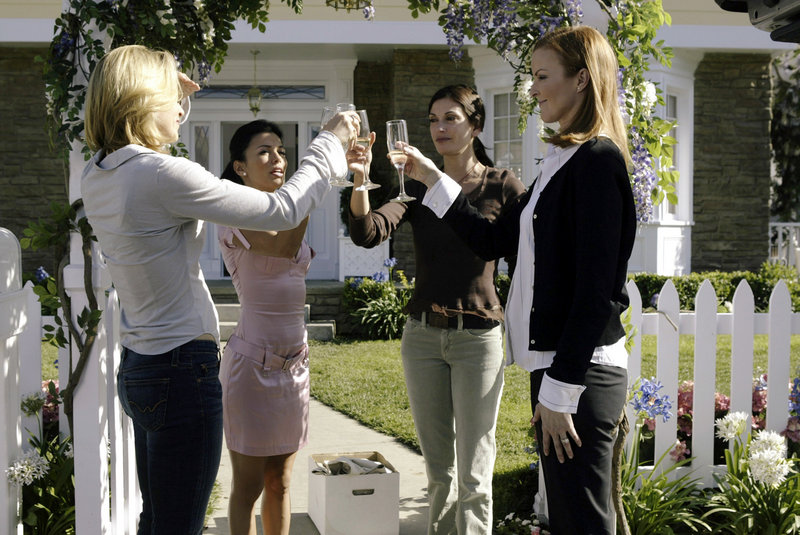 From left, Felicity Huffman, Eva Longoria, Teri Hatcher and Marcia Cross toast one another in a scene from ABC’s “Desperate Housewives.” According to a person familiar with ABC’s plans for the drama – which debuted in 2004 – the end is near for the pop icon.