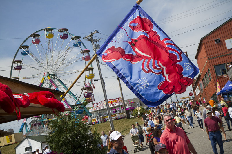 Harbor Park exudes a festive air with carnival rides and food vendors.