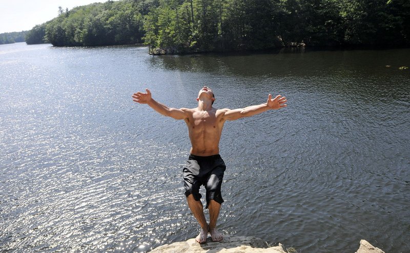 Matt LeBlanc of Dayton jumps into the Saco River in Buxton on July 22, when the temperature in Portland hit 100 degrees.