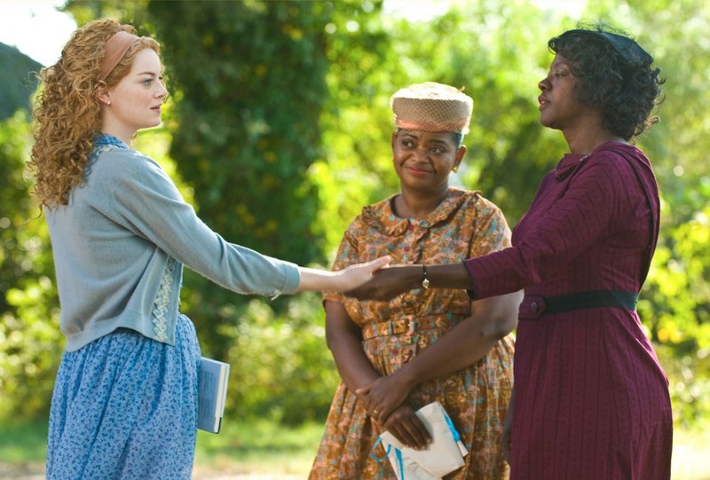 Skeeter Phelan (Emma Stone, left), Minnie Jackson (Octavia Spencer, center) and Aibileen Clark (Viola Davis) together take a risk that could have profound consequences for them all in "The Help," which focuses on the lives of black maids in 1960s Mississippi.