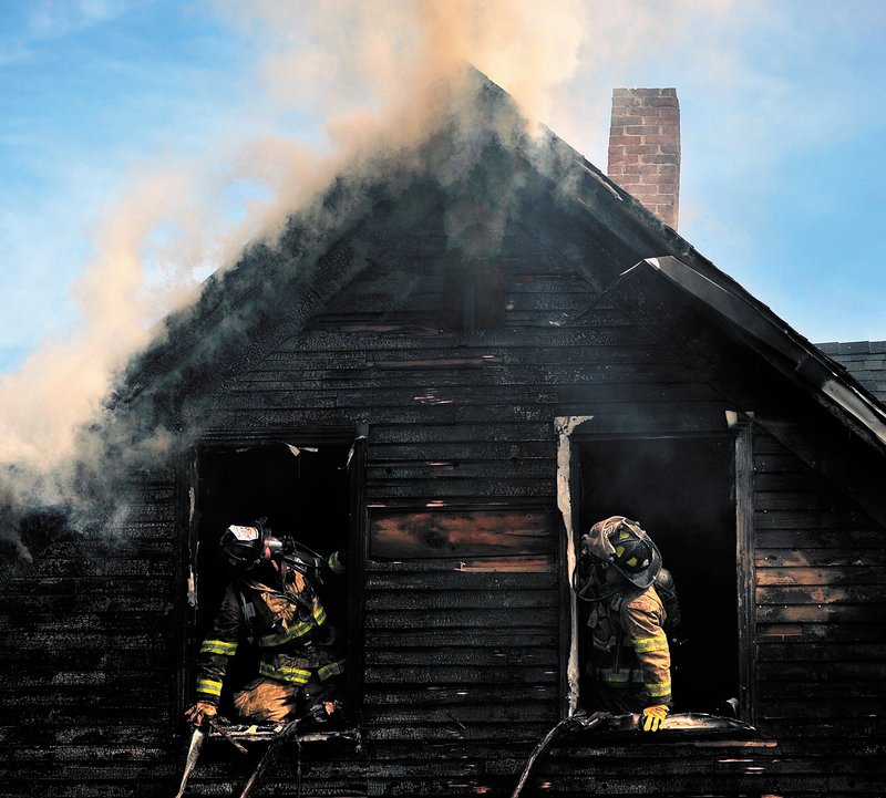 Forty firefighters from departments in Waterville, Winslow, Fairfield and Oakland responded to a house fire on Oak Street in Waterville on Tuesday morning. No injuries were reported.
