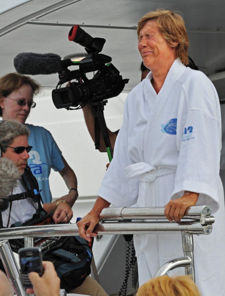 Diana Nyad cries as she speaks to reporters and fans after arriving back in Key West on Tuesday after her attempt to swim from Cuba failed.