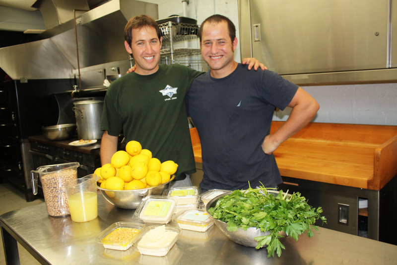 Brothers Ariel and Amit Glazer in the Portland kitchen where they make Ariel’s Hummus.