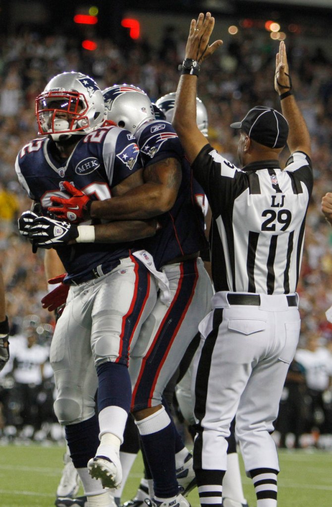 Stevan Ridley celebrates with his teammates Thursday night after scoring the first touchdown of the exhibition season for the New England Patriots – a 1-yard run in the first quarter of the 47-12 victory against the Jacksonville Jaguars.