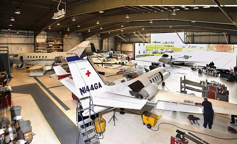 The maintenance hangar at Maine Aviation Corp. holds several large jets and some smaller prop planes being worked on by the maintenance crew. Many are there for routine maintenance, while others are being refurbished for sale.