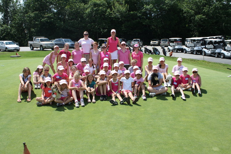 This is a photo of the campers with their instructors. Left to right: Katie Whittum (back row, second from left), Edith Aromando, Maura Quigley, Laura Grant, Shannon Mitchell, Meghan Bickford, Megan Hudson, Sarah Hansen. They are all instructors at Megha' s Camp and are pictured on Pink Thursday with the kids.