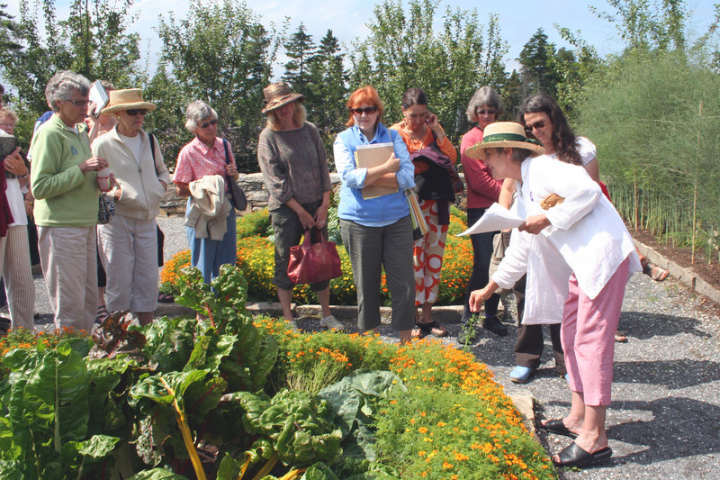 Nancy Wetzel of the Sarah Orne Jewett House leads a recent program on herbs at Coastal Maine Botanical Gardens.