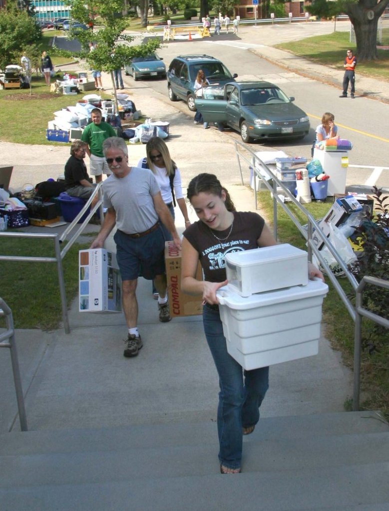 A student moves into a dorm at the University of Southern Maine in this file photo.