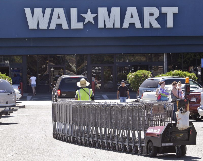 Walmart’s second-quarter profit rose 5.7 percent, fueled by strong international sales growth and cost cutting.