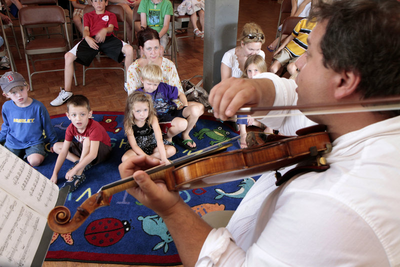 Ferdinand Liva of the DaPonte String Quartet performs in a recent concert for children at Rivertree Arts in Kennebunk. Liva and Myles Jordan are the two remaining original members of the quartet, founded 20 years ago.