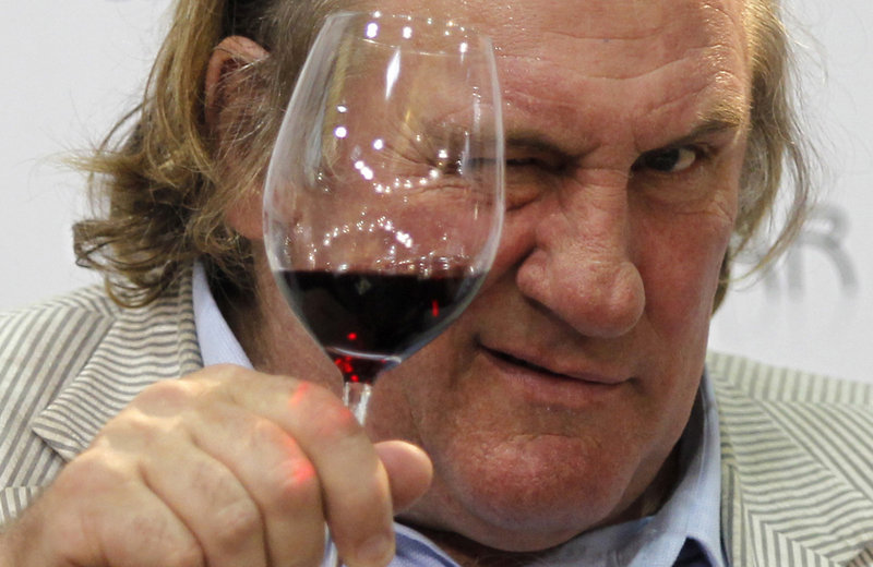 Gerard Depardieu, shown in a wine commercial.