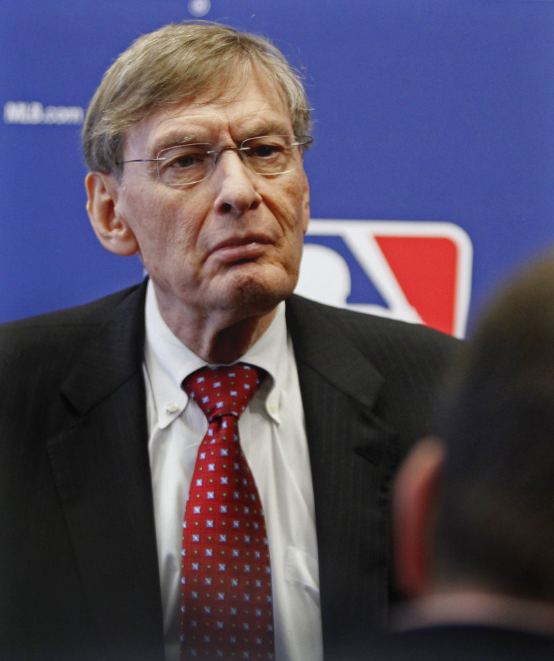 Bud Selig, the baseball commissioner, is said to favor adding two playoff teams next season in a structure that would give a geater benefit to teams winning their division.