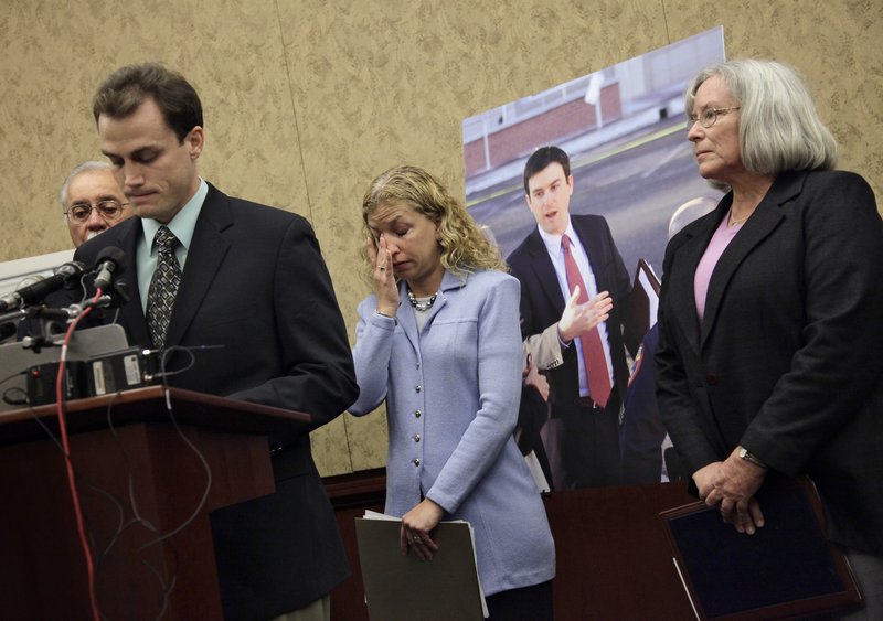Gabe Zimmerman, the slain aide to Rep. Gabrielle Giffords, is remembered during a July ceremony on Capitol Hill. Rep. Debbie Wasserman Schultz, D-Fla., center, stands with Gabe’s mother Emily Nottingham, right, and brother Ben Zimmerman as they introduce a bill to name a room in the Capitol complex after the congressional assistant. Giffords called Ross Zimmerman, Gabe’s father, to express her condolences after learning about her aide’s death.