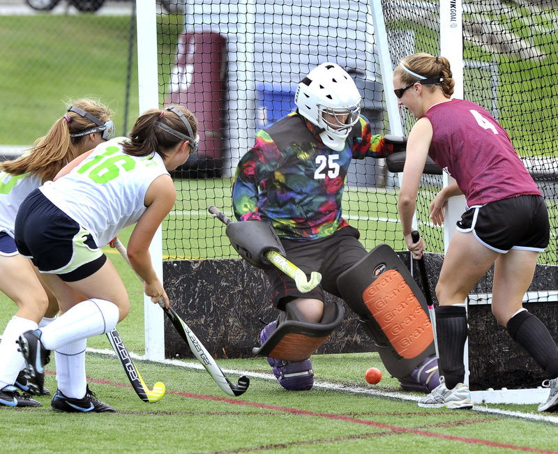 Yarmouth's Susannah Daggett slips a shot past Greely keeper Michelle Gray for a goal on Monday in Cape Elizabeth. Yarmouth and Greely were among the 16 squads that took part in Cape's annual play day, during which teams play five or six 25-minute games.