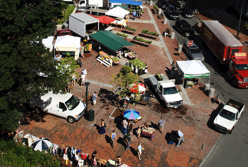 The farmers market in Monument Square has grown to include not only farmers, but also vendors and performers. A new effort may bring an international flavor to Monday’s market.