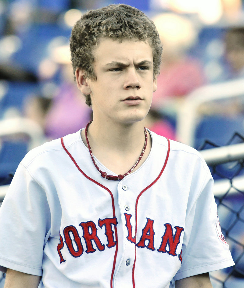 Elliott Speirs, a Sea Dogs bat boy, is two years younger than Bryce Harper, but their worlds are far apart.