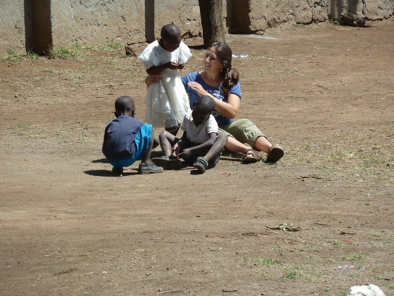 Becky Schaffer plays with children in Gilgil, Kenya, in June 2010. “(She) loved making the kids smile,” her sister said.