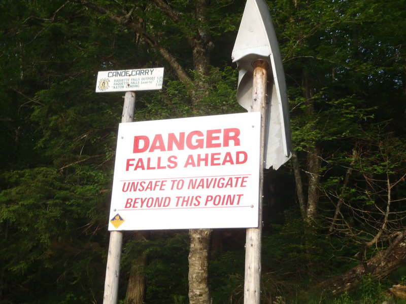 A sign warns of danger near Raquette Falls in New York.