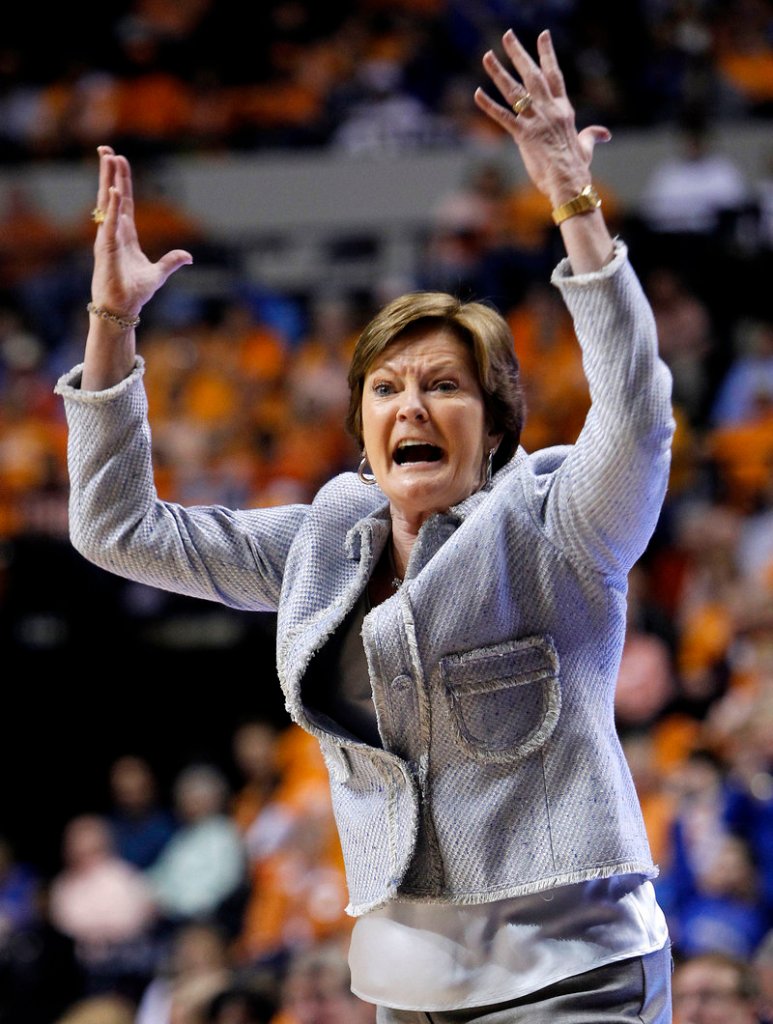 Pat Summitt says she’ll continue as Tennessee’s coach despite a diagnosis of early onset dementia.