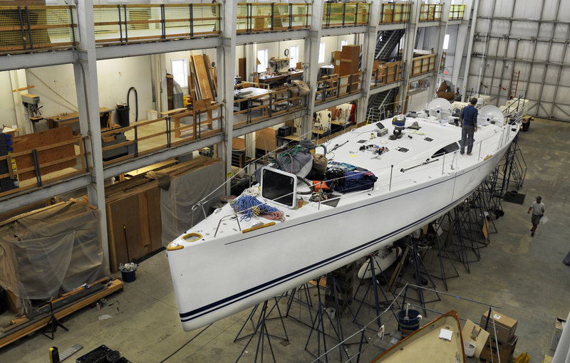 Lyman-Morse employees work on the Baraka, a racer-cruiser yacht built by the Thomaston-based company in 2006.