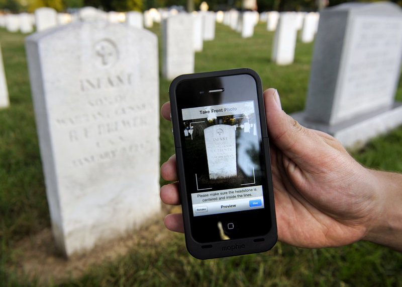 Soldiers with the Old Guard, the Army's official ceremonial unit, use iPhones as part of Task Force Christman, in which they photograph and catalog more than 219,000 grave markers and the front of more than 43,000 sets of cremated remains at Arlington National Cemetery.