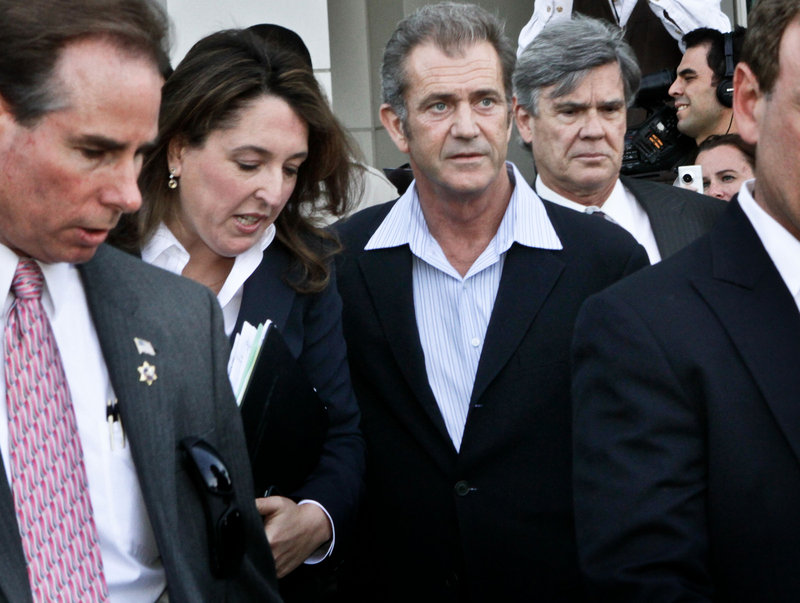 Actor Mel Gibson, right, leaves Los Angeles Airport Courthouse after facing charges of domestic violence March 11. He and ex-girlfriend Oksana Grigorieva have been in a custody and financial battle for more than a year.