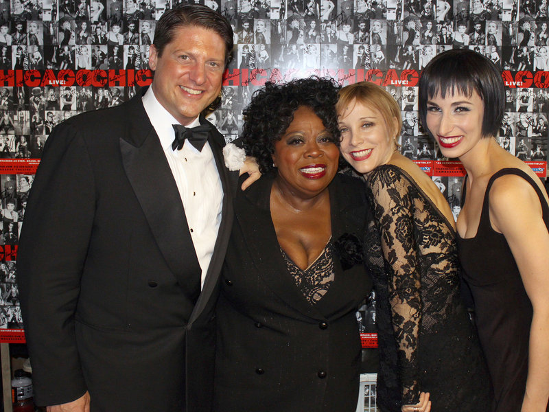 “Chicago” cast members Christopher Sieber (Billy Flynn), Carol Woods (Matron “Mama” Morton), Nikka Graff Lanzarone (Velma) and Charlotte d’Amboise (a veteran Roxie Hart) pose for a photo Friday in New York.