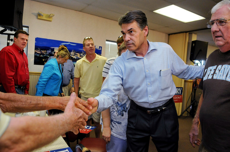 Republican presidential candidate Texas Gov. Rick Perry stops at Tommy’s Country Ham House in Greenville, S.C. One state official said the safety of Perry and his family could be jeopardized if his travel security arrangements are made public.