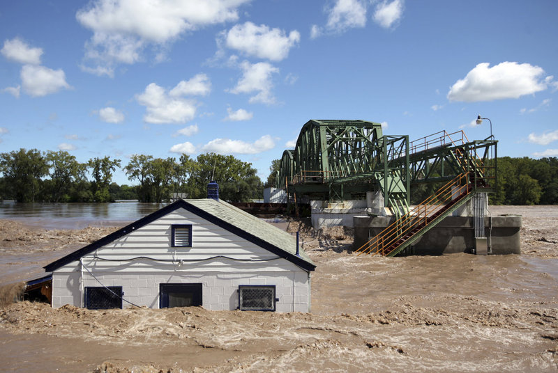 Floodwaters overwhelm Lock 8 on the Erie Canal in Rotterdam, N.Y., on Monday in the aftermath of Irene. “We were expecting flooding. We weren’t expecting devastation,” said Bobbi-Jean Jeun of Clarksville, N.Y.