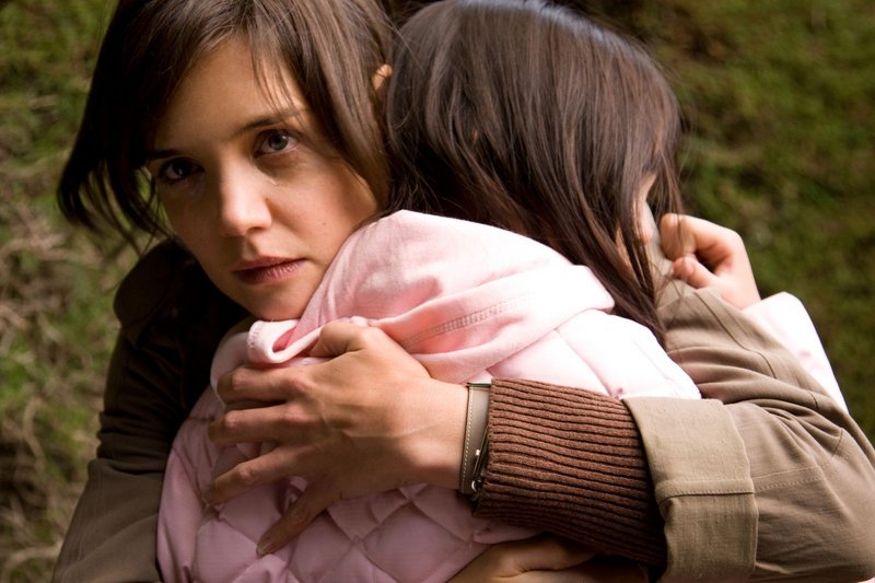 Kim (Katie Holmes) comforts Sally (Bailee Madison) in Guillermo del Toro's "Don't Be Afraid of the Dark."