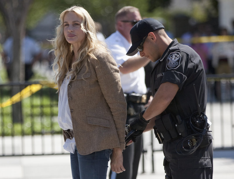 Actress Daryl Hannah is arrested by U.S. Park Police in front of the White House in Washington during a protest against the Keystone oil pipeline Tuesday.