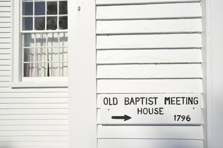 Vintage sign on the exterior of the Old Baptist Meeting House.
