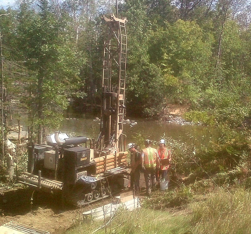 Work is underway Thursday morning to open Route 27 in Carrabassett Valley where two bridges were destroyed Sunday by Tropical Storm Irene. Temporary bridges are expected to open Tuesday.