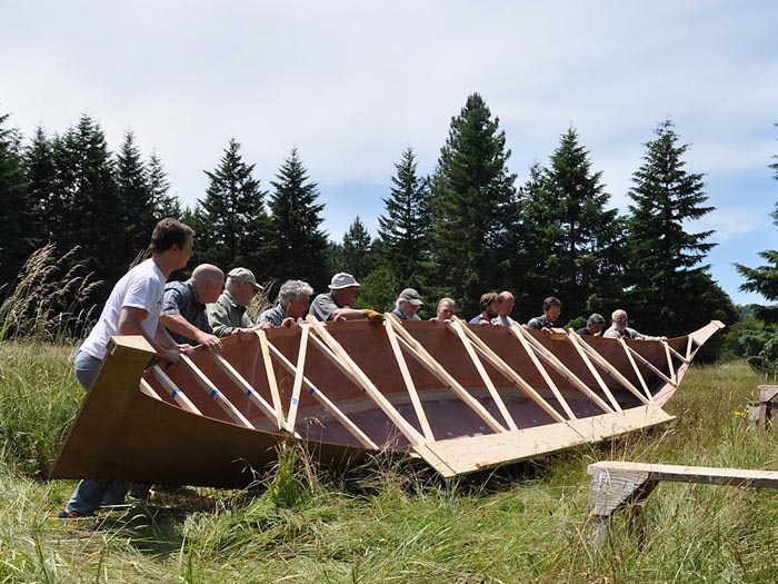 In this June 2011 photo, the 36-foot replica of a canoe stolen from the Chinook Indians is under construction in Veneta, Ore.
