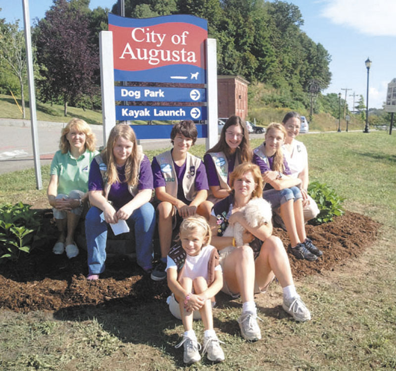 DOG PARK A GROUP EFFORT: Marianne Sansouci and Michelle Brown were dismissed as leaders of an Augusta-based Girl Scout troop after soliciting funds for a community service project. Involved in the project were, back row from left, Jeanne Gibson, Desiree Lyon-Johnson, Yulia Gibson, Jessica Gargiulo, Sydney Sansouci and Marianne Sansouci; and front row, Jillian Brown, left, and Michelle Brown.