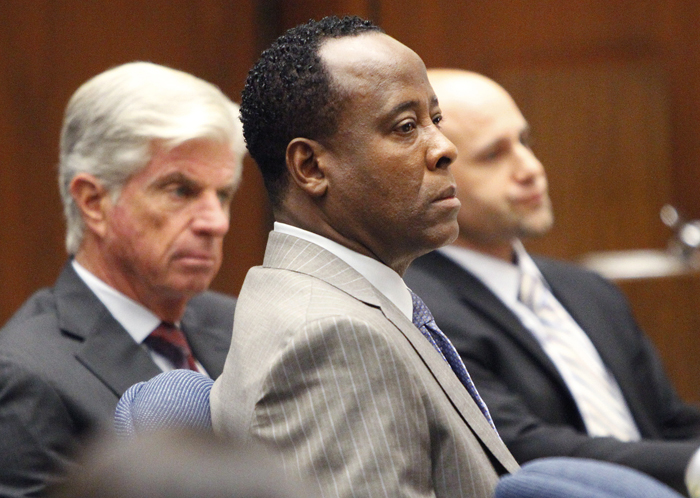 Conrad Murray listens to the prosecution's opening arguments in his involuntary manslaughter trial today in Los Angeles.