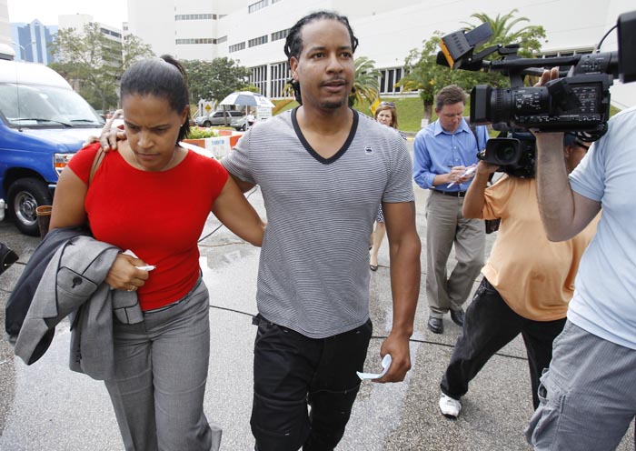 Manny Ramirez is escorted by an unidentified family member as he leaves the Broward County Jail in Ft. Lauderdale, Fla., today.